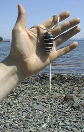 Spiral-wrapped stone pendant