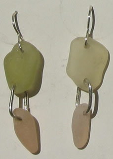 Two rare pink glass dangles